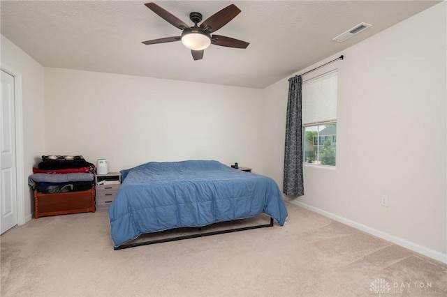 1009 Glen Kegley Dr, Xenia, OH 45385 - carpeted bedroom with baseboards and a ceiling fan