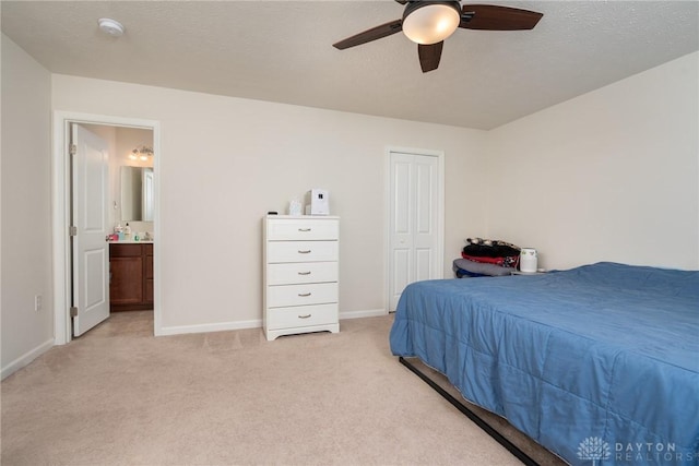 1009 Glen Kegley Dr, Xenia, OH 45385 - bedroom with light carpet, a closet, and ceiling fan