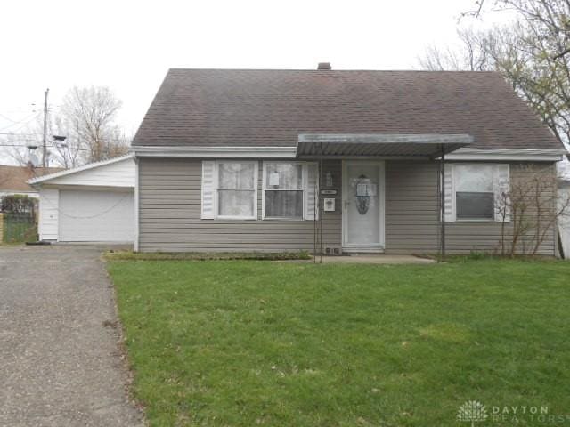 1930 Emerald Ct, Dayton, OH 45403 - view of front facade featuring a front yard, a garage, and a shingled roof