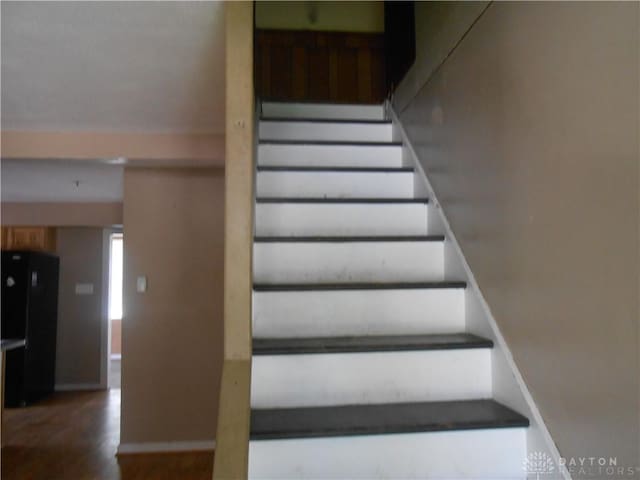 1930 Emerald Ct, Dayton, OH 45403 - stairway with wood finished floors and baseboards