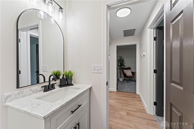 1209 Maple St, Troy, OH 45373 - bathroom featuring vanity and wood finished floors