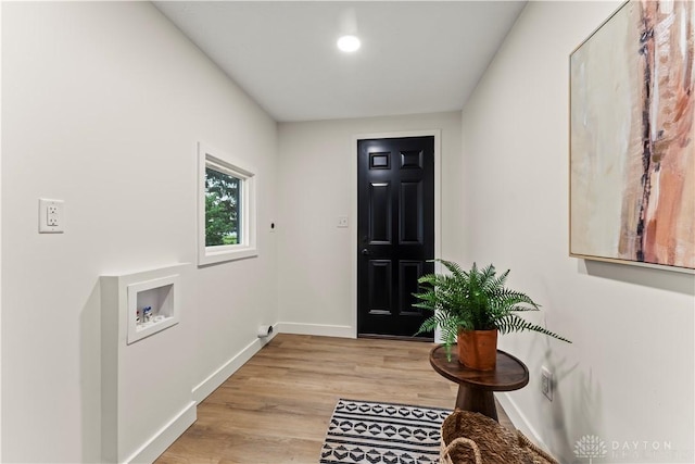1209 Maple St, Troy, OH 45373 - entryway featuring baseboards and light wood finished floors