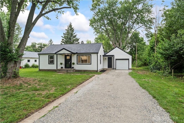 1209 Maple St, Troy, OH 45373 - single story home with a garage, an outbuilding, a front yard, driveway, and a chimney