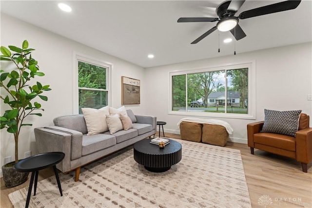 1209 Maple St, Troy, OH 45373 - living room featuring light wood-style flooring, recessed lighting, and a ceiling fan