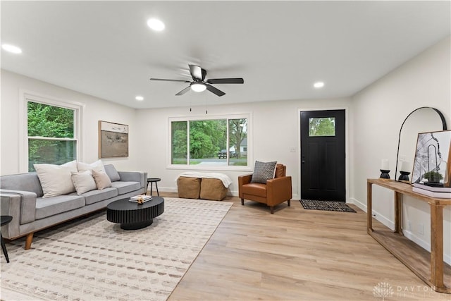 1209 Maple St, Troy, OH 45373 - living area with light wood-style flooring, recessed lighting, and a ceiling fan