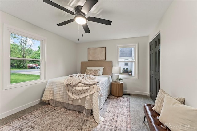 1209 Maple St, Troy, OH 45373 - bedroom featuring multiple windows, carpet flooring, and ceiling fan