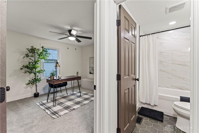 1209 Maple St, Troy, OH 45373 - office area with ceiling fan, dark carpet, and recessed lighting