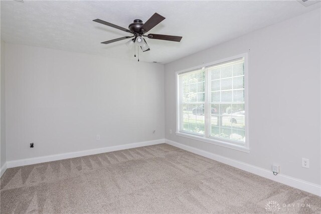 1129 Eureka Dr, Kettering, OH 45419 - unfurnished room with carpet floors and ceiling fan