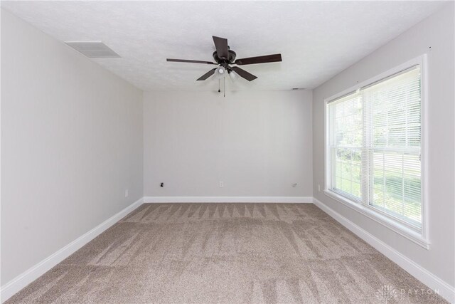 1129 Eureka Dr, Kettering, OH 45419 - unfurnished room with carpet floors and a ceiling fan