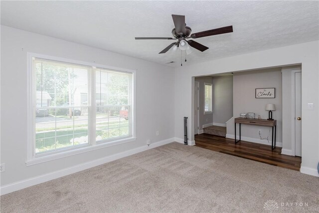 1129 Eureka Dr, Kettering, OH 45419 - carpeted empty room with ceiling fan and baseboards