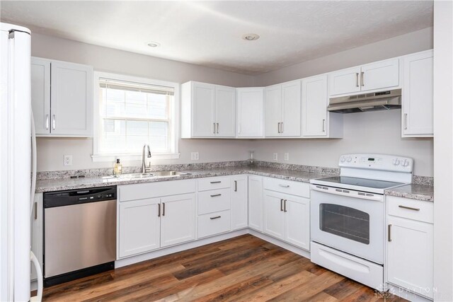 1129 Eureka Dr, Kettering, OH 45419 - kitchen featuring white appliances, under cabinet range hood, white cabinetry, and recessed lighting