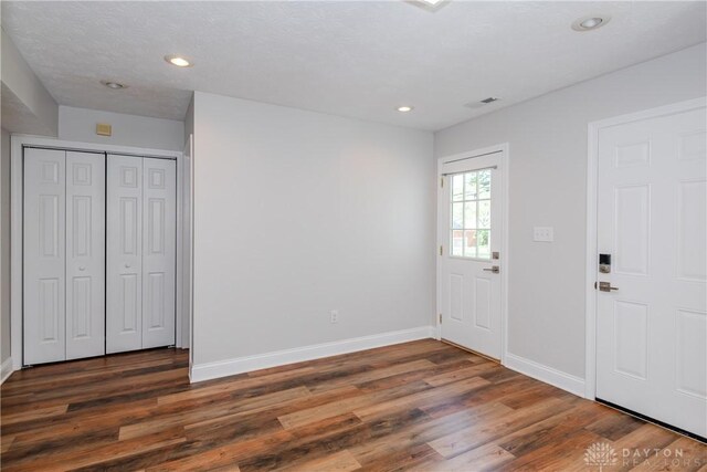 1129 Eureka Dr, Kettering, OH 45419 - entrance foyer featuring wood finished floors and recessed lighting