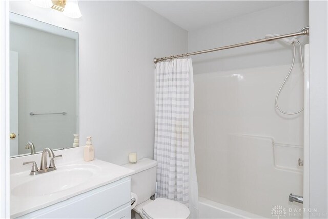 1129 Eureka Dr, Kettering, OH 45419 - full bathroom with vanity and shower / tub combo with curtain