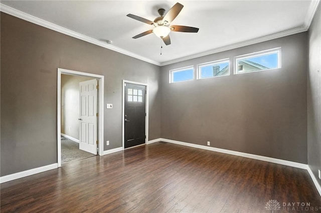 118 Hill St, Xenia, OH 45385 - empty room featuring crown molding, a ceiling fan, and wood finished floors