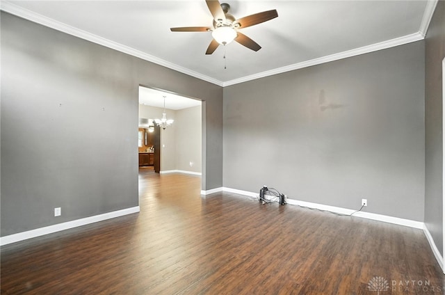 118 Hill St, Xenia, OH 45385 - unfurnished room featuring ceiling fan, dark wood finished floors, crown molding, and a chandelier