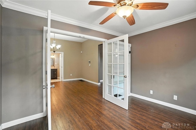 118 Hill St, Xenia, OH 45385 - unfurnished room with ceiling fan, crown molding, wood finished floors, a chandelier, and french doors