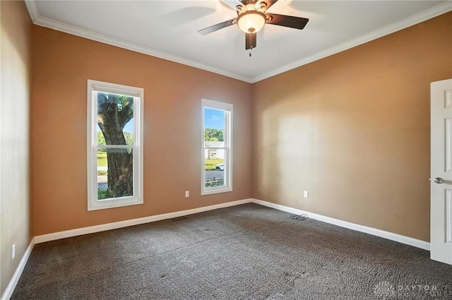118 Hill St, Xenia, OH 45385 - spare room featuring ornamental molding, dark colored carpet, and a ceiling fan