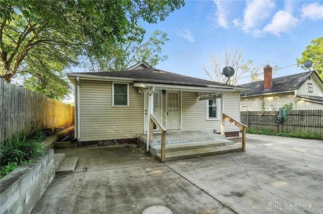 118 Hill St, Xenia, OH 45385 - rear view of house with a patio area and a fenced backyard