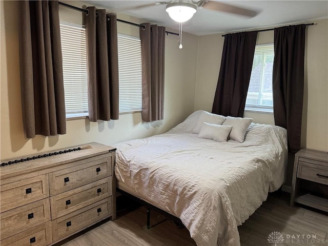 6346 Apache St, Dayton, OH 45424 - bedroom with light wood finished floors and ceiling fan