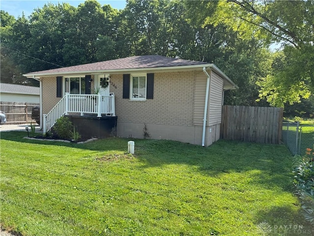 6346 Apache St, Dayton, OH 45424 - view of front of house with brick siding and crawl space