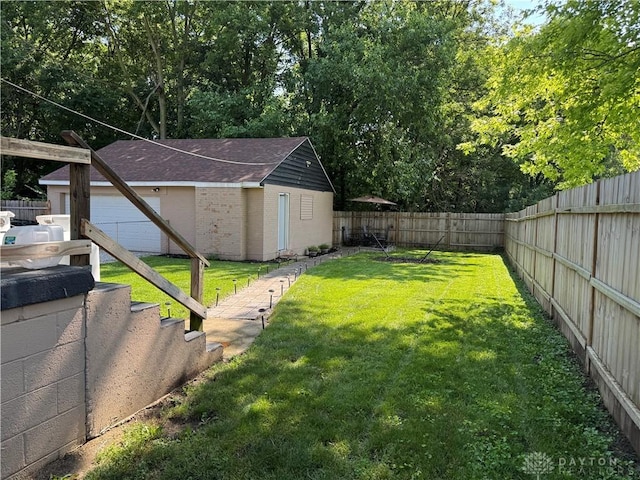 6346 Apache St, Dayton, OH 45424 - fenced backyard featuring an outbuilding