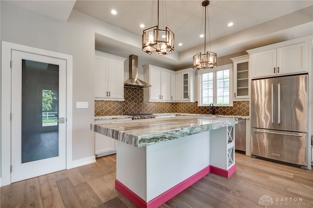 1461 Abbey Park Pl, Beavercreek Twp, OH 45385 - kitchen with stainless steel appliances, wall chimney range hood, light wood finished floors, white cabinetry, and recessed lighting