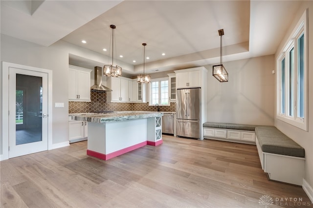 1461 Abbey Park Pl, Beavercreek Twp, OH 45385 - kitchen featuring stainless steel appliances, wall chimney exhaust hood, white cabinetry, tasteful backsplash, and recessed lighting