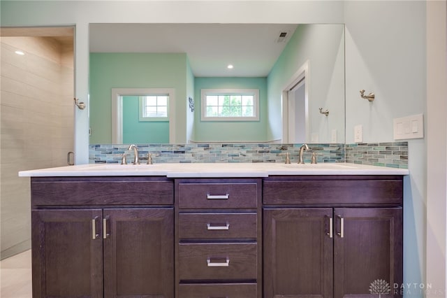 1461 Abbey Park Pl, Beavercreek Twp, OH 45385 - bathroom with double vanity and decorative backsplash