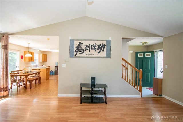 3583 King Edward Way, Beavercreek, OH 45431 - entryway featuring light wood finished floors, vaulted ceiling, and stairs