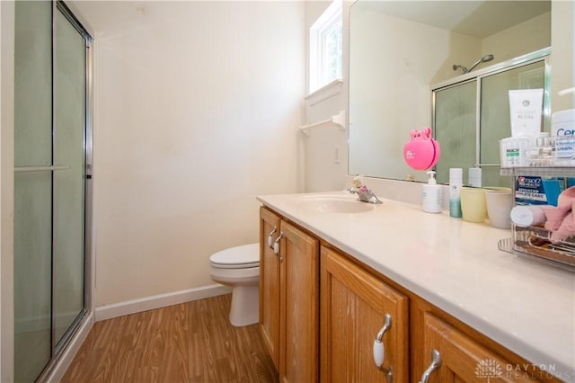 3583 King Edward Way, Beavercreek, OH 45431 - bathroom with vanity, wood finished floors, and a shower with shower door
