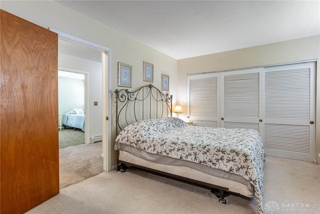 5136 Oleva Dr, Sugarcreek Twp, OH 45440 - bedroom featuring carpet floors, baseboard heating, and a closet