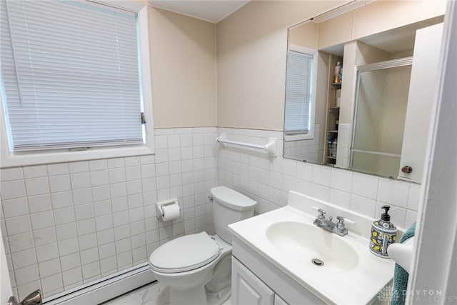 5136 Oleva Dr, Sugarcreek Twp, OH 45440 - full bathroom featuring a baseboard radiator, a stall shower, tile walls, vanity, and wainscoting