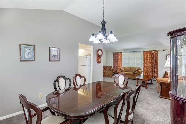 5136 Oleva Dr, Sugarcreek Twp, OH 45440 - dining space featuring lofted ceiling, a chandelier, and carpet