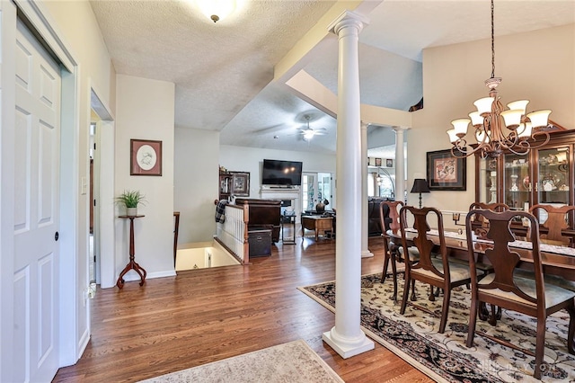 595 Heatherwoode Cir, Springboro, OH 45066 - foyer with ornate columns, wood finished floors, ceiling fan, a textured ceiling, and a chandelier