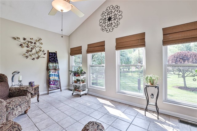 595 Heatherwoode Cir, Springboro, OH 45066 - sitting room with healthy amount of natural light, high vaulted ceiling, light tile patterned floors, and a ceiling fan