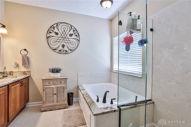 595 Heatherwoode Cir, Springboro, OH 45066 - bathroom featuring vanity, a bath, tile patterned flooring, and a shower