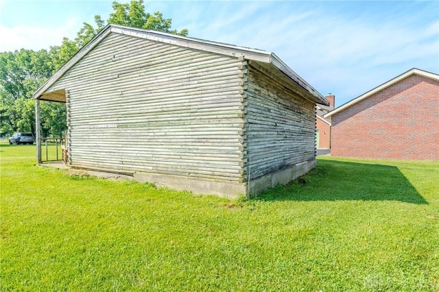 1061 Mcpherson Rd, Xenia, OH 45385 - view of side of property with log siding and a lawn