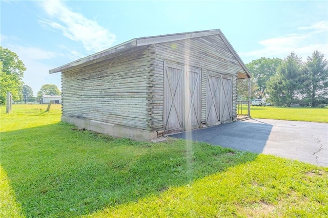 1061 Mcpherson Rd, Xenia, OH 45385 - view of outdoor structure with asphalt driveway
