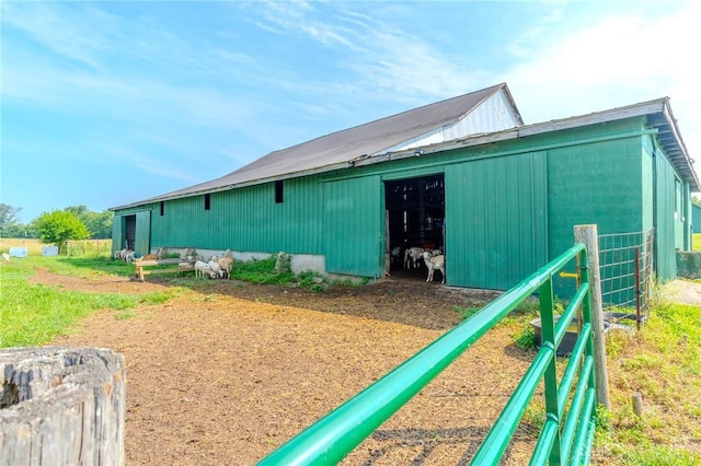 1061 Mcpherson Rd, Xenia, OH 45385 - view of property exterior featuring an outdoor structure, a metal roof, and an outbuilding