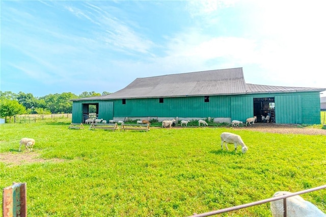 1061 Mcpherson Rd, Xenia, OH 45385 - rear view of house featuring an outbuilding, an outdoor structure, and a metal roof