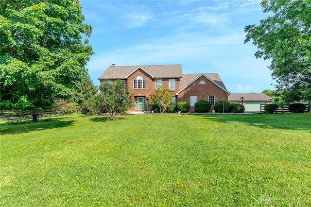 1061 Mcpherson Rd, Xenia, OH 45385 - colonial house with brick siding and a front lawn