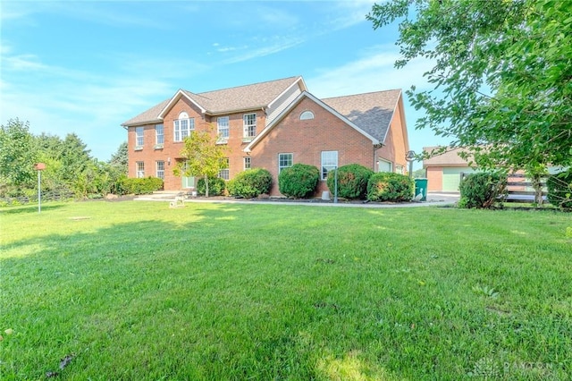 1061 Mcpherson Rd, Xenia, OH 45385 - colonial house with a front lawn and brick siding