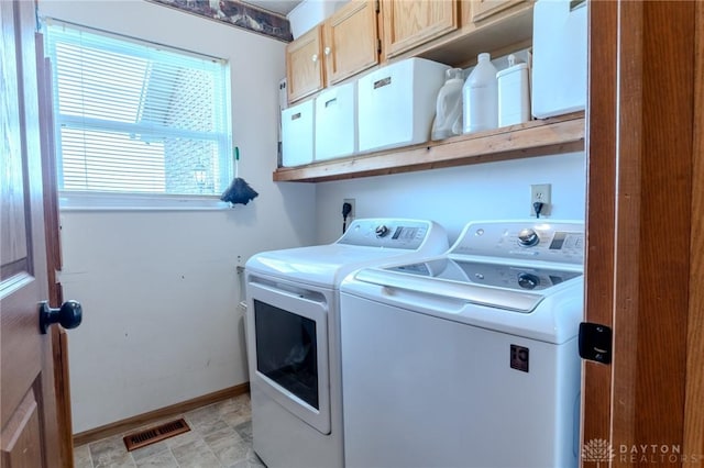 1061 Mcpherson Rd, Xenia, OH 45385 - laundry area with independent washer and dryer and cabinet space