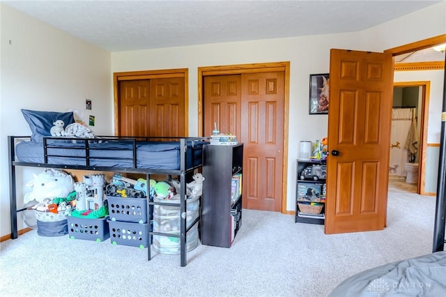1061 Mcpherson Rd, Xenia, OH 45385 - bedroom featuring carpet and two closets
