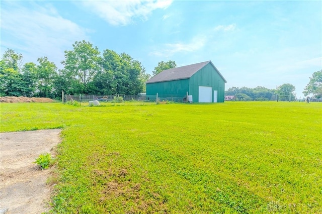 1061 Mcpherson Rd, Xenia, OH 45385 - view of yard with a garage and an outbuilding