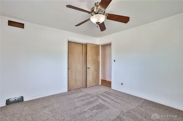 1095 Susan Dr, Hamilton, OH 45013 - unfurnished bedroom with light colored carpet, a closet, and ceiling fan