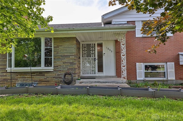 1095 Susan Dr, Hamilton, OH 45013 - entrance to property featuring covered porch and brick siding