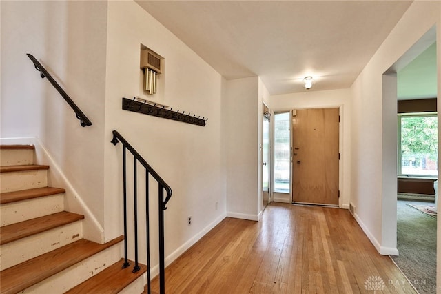 1095 Susan Dr, Hamilton, OH 45013 - foyer entrance featuring wood-type flooring and stairs
