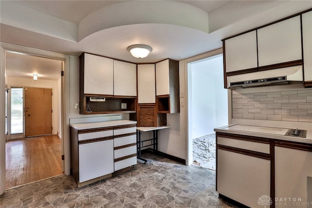 1095 Susan Dr, Hamilton, OH 45013 - kitchen with light countertops, decorative backsplash, and white cabinetry
