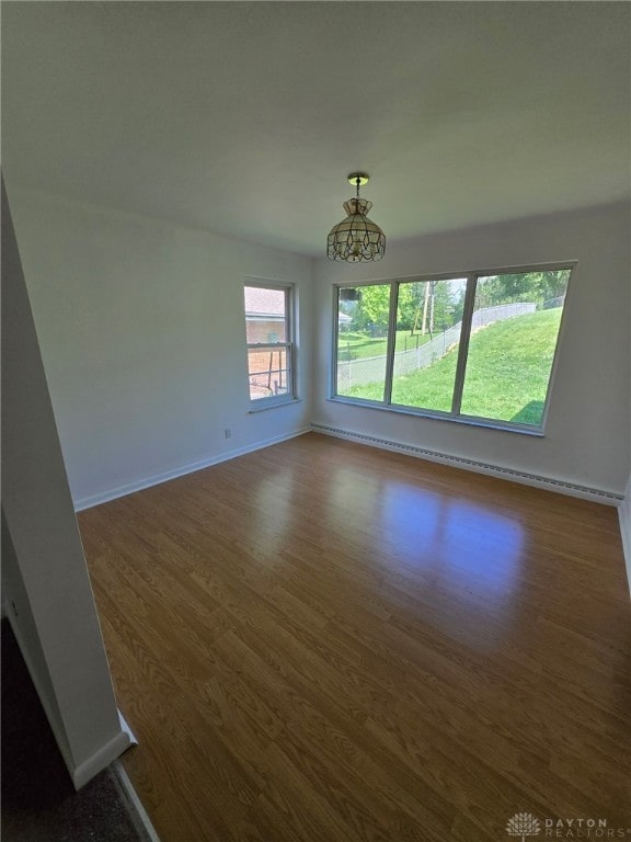 1095 Susan Dr, Hamilton, OH 45013 - spare room with dark wood-style floors and baseboards